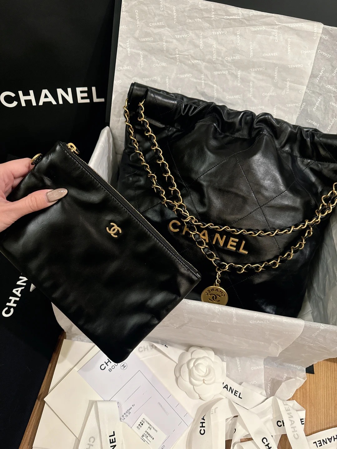 CHANEL 22 Handbag Shiny Calfskin & Gold-Tone Metal Black CHANEL 22 Handbag Shiny Calfskin & Gold-Tone Metal Black