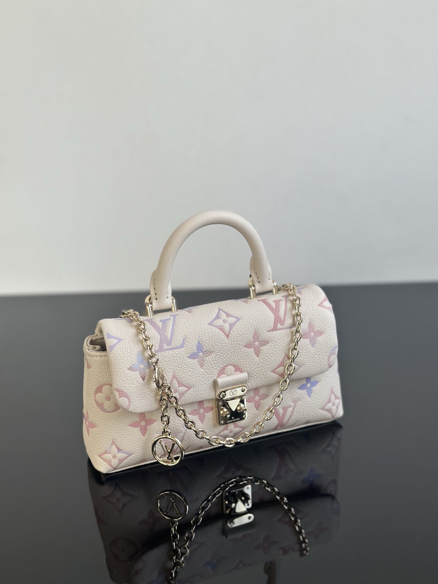 LOUIS VUITTON Nano Madeleine Monogram Empreinte Leather Handbag