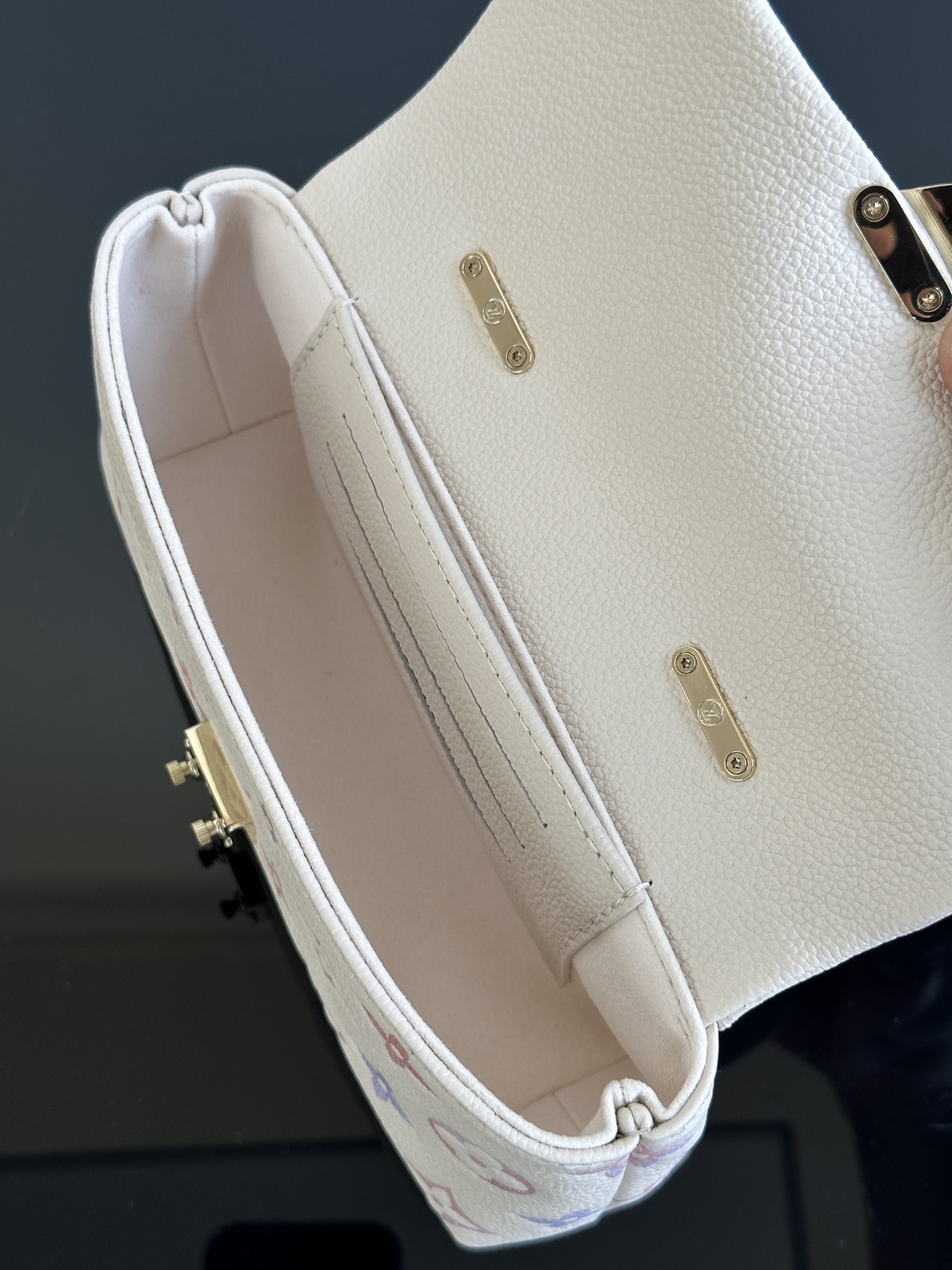 LOUIS VUITTON Nano Madeleine Monogram Empreinte Leather Handbag