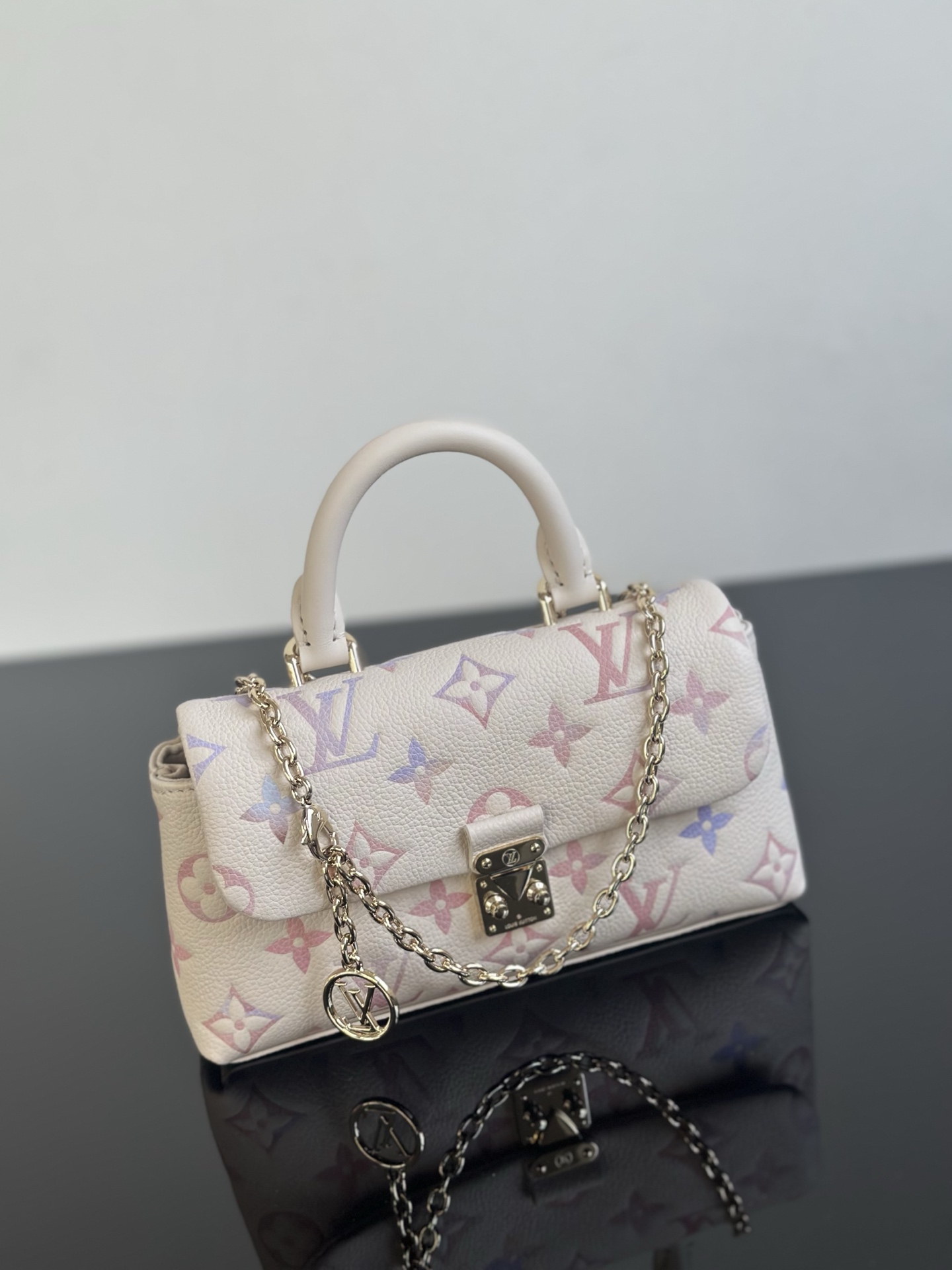 LOUIS VUITTON Nano Madeleine Monogram Empreinte Leather Handbag